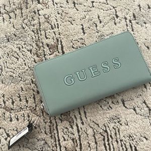 Guess wallet with tags